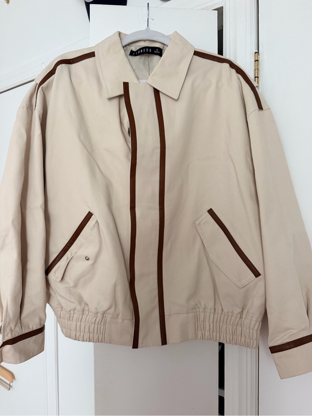 Lioness Beige Jacket with Brown Trim
